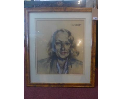 A 20th century Continental School framed portrait of a lady, in pastel and charcoal, signed upper right, H.58cm W.48cm 