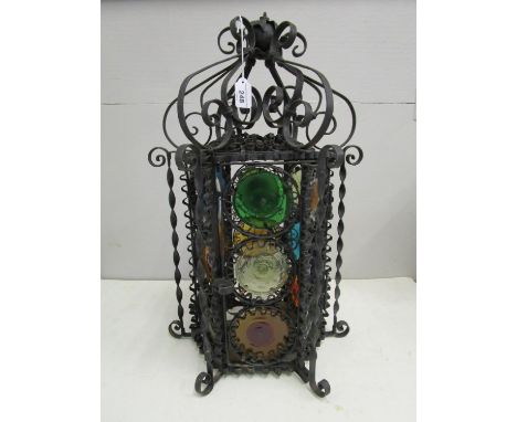 An Arts & Crafts wrought iron and Venetian glass ceiling lamp, circa 1890, the fancy wrought iron frame containing nineteen i