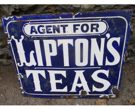 A vintage double sided enamel Lipton's tea sign in blue and white, 14" x 17" 