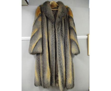 A vintage full length fox fur coat, approximately 44-46 chest and 48" long 