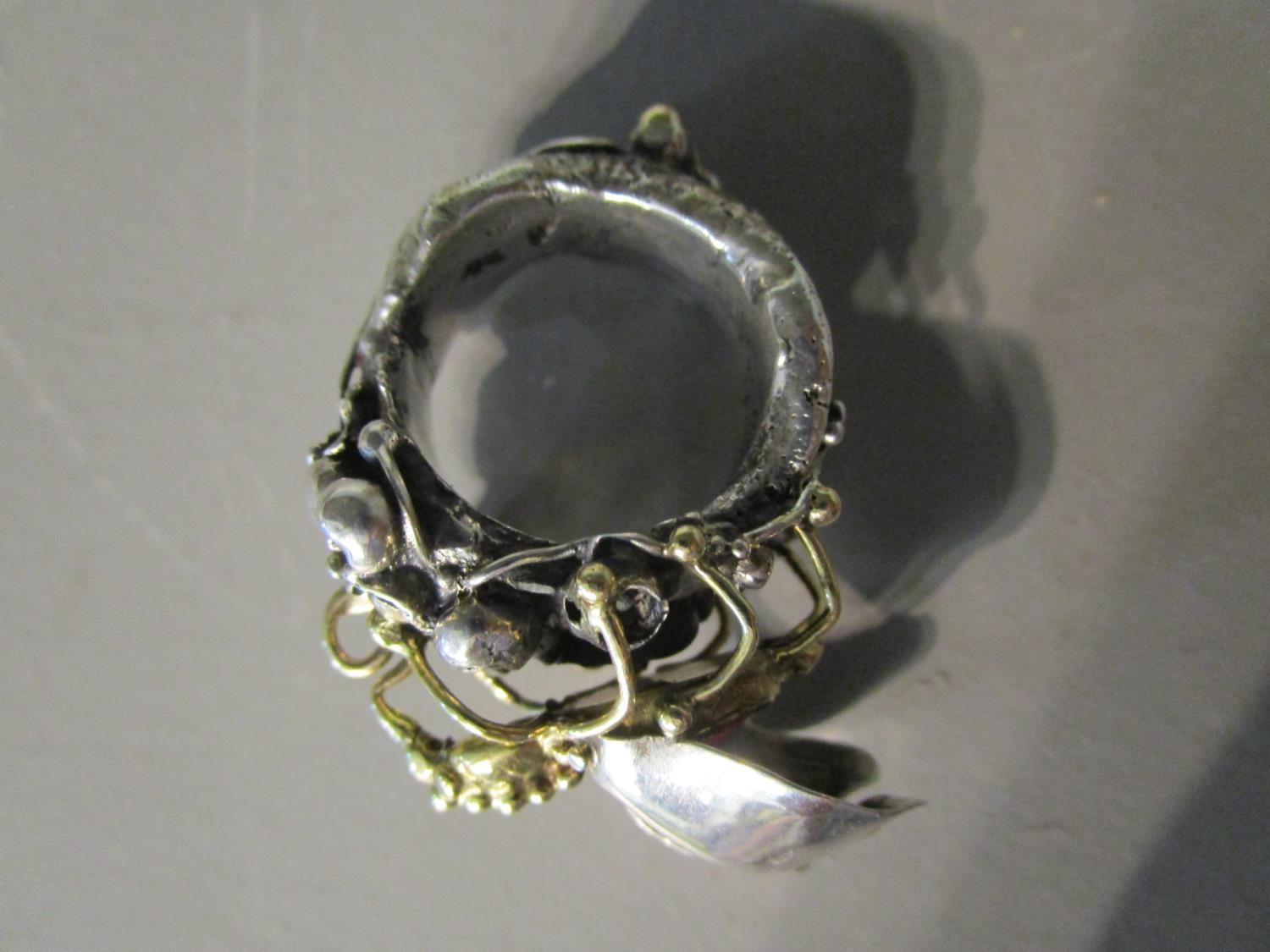 Michael Allen Bolton 1938-2006 - a cast silver ring with applied fly ...