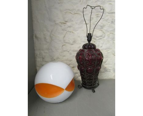 A mid 20th century Murano red glass and wrought iron cased table lamp, probably Seguso, 16" h and a mid 20th century space ag
