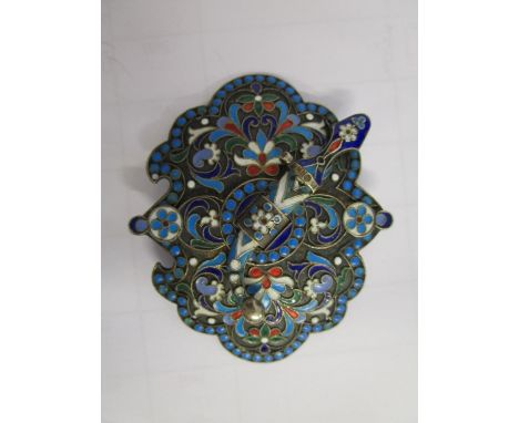 A Russian silver gilt and cloisonne enamelled belt buckle, with floral decoration, the two parts held together with a pin in 