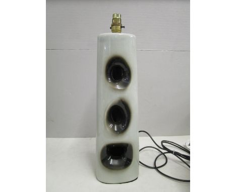 A 1950s retro two tone grey ceramic table lamp of triangular section with pierced holes to the hollow body, 17 5/8", h, witho