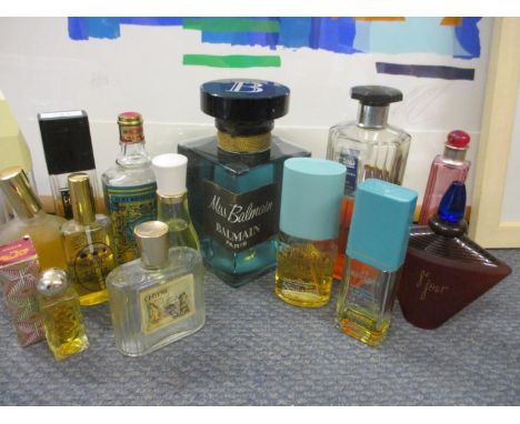 A vintage oversized Balmain 'Miss Balmain' display bottle and a collection of vintage fragrances A/F to include Je Reviens 'W