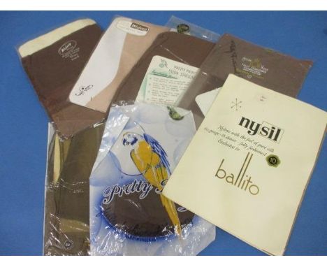 Seven packets of vintage tights and stockings to include Wolsey, in original packaging 