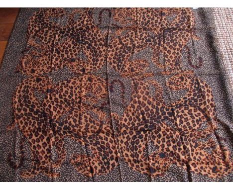 An Yves Saint Laurent silk and wool leopard print shawl with branded box, 55" x 55" together with A late 20th century Lanvin 