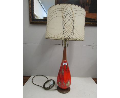 Maurice Chalvignac (Canadian Fl 1957-70s) - a mid 20th century mottled orange pottery and teak volcano lamp, with period parc