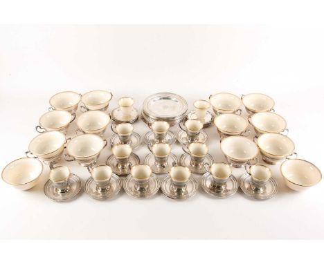 A Lenox Porcelain coffee and dessert service, set in Gorham Sterling Silver mounts, comprising twelve demitasse cups with hol