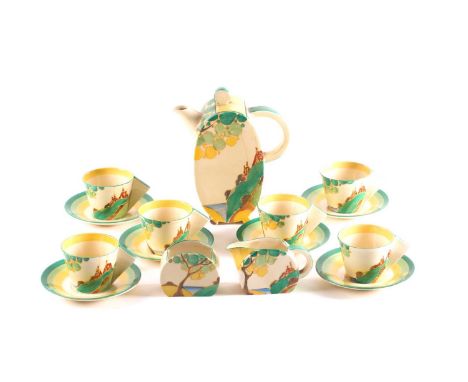 A Clarice Cliff Bon Jour coffee service, circa 1933, in the 'Secrets' pattern, comprising coffee pot, cream, sugar and six cu
