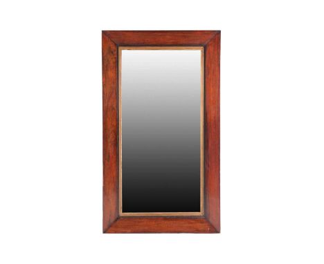 A Victorian rectangular figured rosewood veneered wall mirror of plain architectural form with gilt moulded slip. 127 cm high
