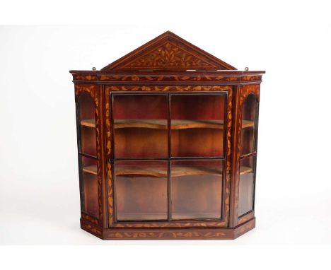 A 19th-century Dutch mahogany and marquetry single door hanging display cabinet with canted angles and triangular pediment. F