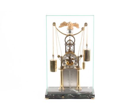 F.H. Whitlock. A French-style twin weight driven brass skeleton timepiece mantle timepiece with eagle surmount, silvered chap