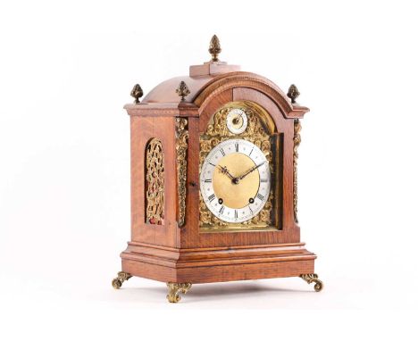 A late 19th-century Winterhalder & Hofmeier eight-day bracket clock with a brass broken arch dial and silvered chapter ring w