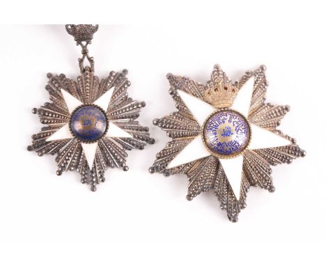 Order Of The Nile. A cased set to include a silver-gilt and enamel neck badge and matching breast sash badge by J.Lattes of C