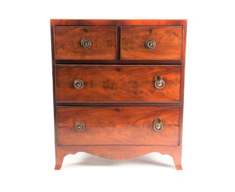 A small George III style satinwood strung mahogany caddy topped chest of drawers. With two short over two longer drawers. On 