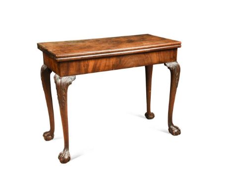 A George III mahogany card table,  with concertina action, the rectangular fold over top enclosing a green baize lined playin