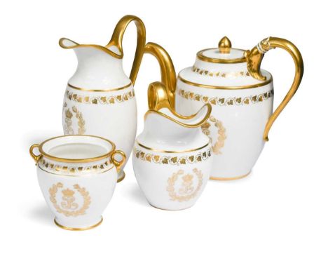 A Sèvres four-piece coffee service, 19th century, for Chateau d'Eu, decorated in gilt with initials within laurel leaf border