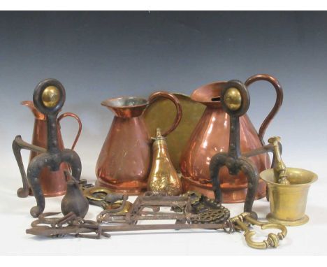 Decorative metalware including fire irons, copper jugs, Goodell apple peeler, brass log bin, pair andirons etc