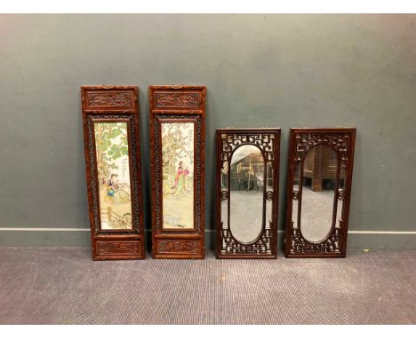 A pair of Chinese hardwood and ceramic screens decorated with courtesans 120 x 36.5cm in rock gardens, together with a pair o