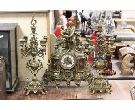 French Gilt Metal Figural Clock Garniture of Classical Form