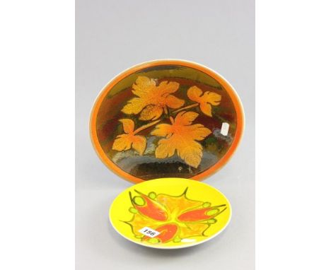 Poole Pottery Plate decorated with Autumn Maple Leaves together with another Poole Pottery Delphis Plate