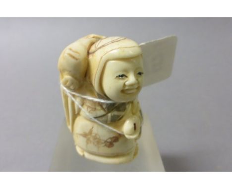 Signed Oxbone Netsuke of a Lady carrying Fish