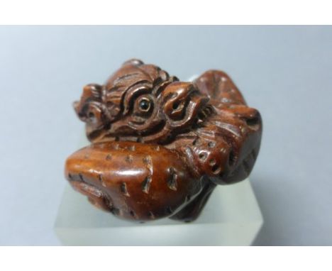 Signed Wood Netsuke of a Dragon Spitting Pearl
