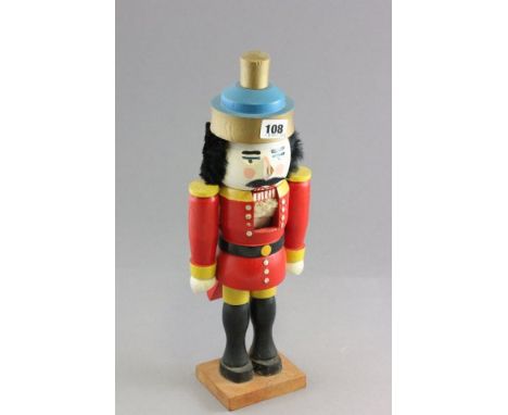 Nutcracker in the form of a Standing to Attention Toy Soldier