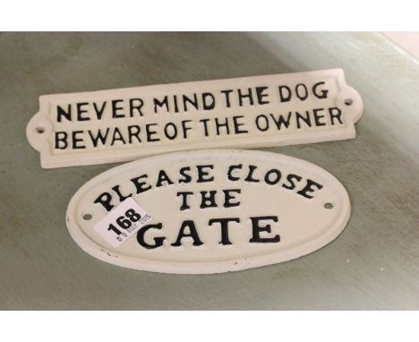 Two cast signs including 'Please Close The Gate' and 'Never Mind The Dog Beware of The Owner'