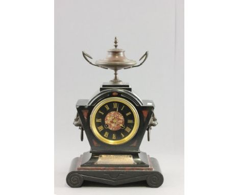 Victorian Slate and Marble Mantle Clock surmounted by a Bronze Urn and with two lion mask handles to side