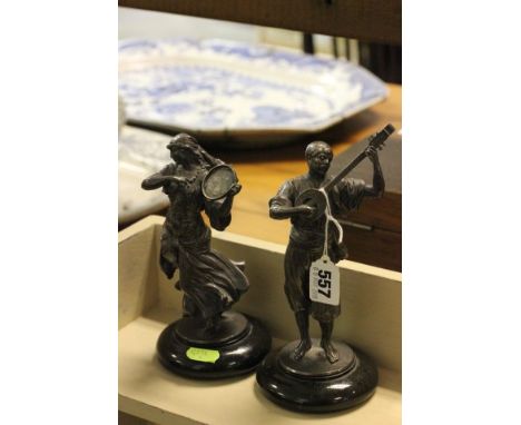 Pair of Spelter Figures on Marble Circular Bases in the form a Gypsy Man and Woman playing Musical Instruments