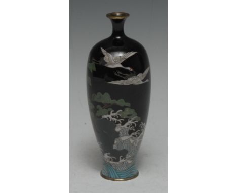 A Chinese cloisonné enamel baluster vase, of small proportions, decorated in polychrome with white cranes flying over a styli