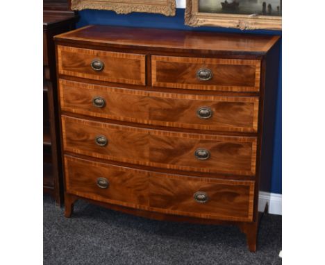 A 19th century satinwood crossbanded mahogany bow-fronted chest, slightly oversailing top above two short and three long grad