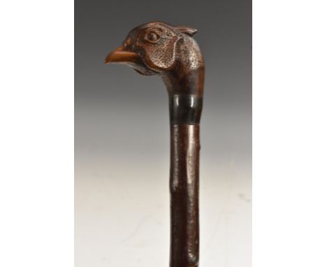 A carved blackthorn walking stick, pheasant, marked SCR, soft cloth case
