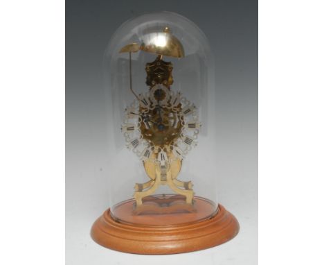 A Gothic Revival style brass skeleton clock, 10cm silvered chapter ring inscribed with Roman numerals, subsidiary seconds dia
