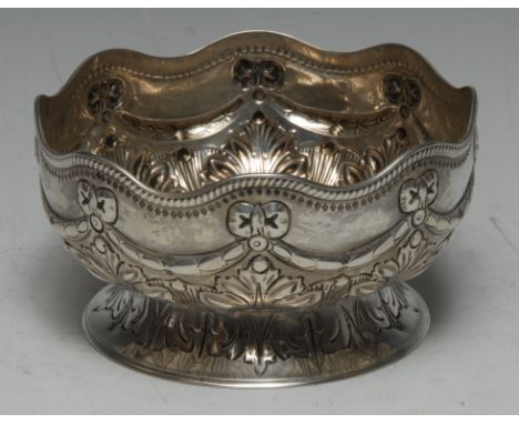 A Victorian silver sugar bowl, undulating lip, embossed ribbon bow swag above foliate body and foot, Martin, Hall &amp; Co. L