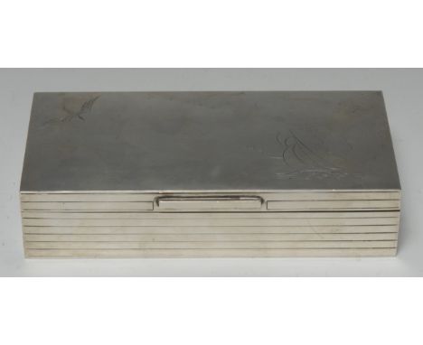 An Art Deco silver rectangular cigarette box, hinged cover engraved with a stylised yacht and a swooping gull, geometric thum