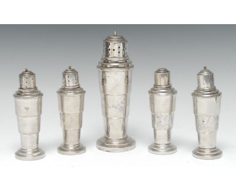 An Art Deco silver 'rocket' shaped sugar caster, stepped geometric cover, shoulder and foot, 18cm high, Birmingham 1937; a se
