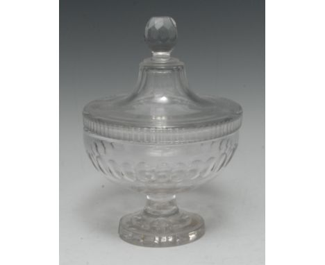 An English pedestal sweetmeat jar, cover and stand, engraved with two bands of ovals, lofty cover, faceted ovoid finial, lemo