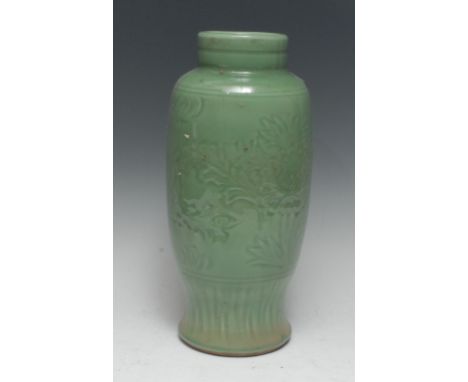 A Chinese celadon ovoid vase, incised in relief with stylised flowers and foliage, 36cm high, 19th centuryProvenance: From th