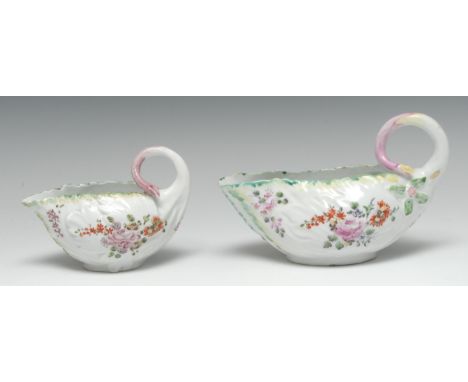 A Derby Cos Lettuce sauce boat, moulded in relief with overlapping leaves, painted in polychrome with flowers and foliage, le