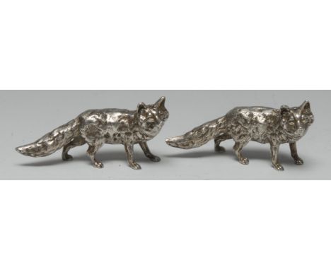 A pair of Elizabeth II cast silver novelty condiments, each cast as a fox, 11cm long, London 1971, 9oz