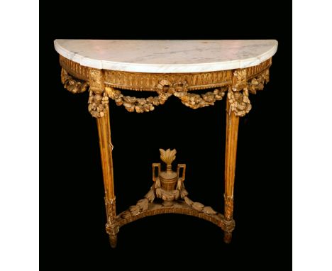 A Neo-Classical giltwood and gesso demi-lune console table, white marble top above a fluted frieze and apron of ribbon-tied s