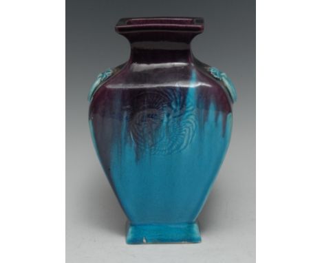 A Chinese turquoise and aubergine glazed rectangular vase, moulded with a phoenix roundel, verso conforming, ring handles to 