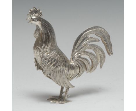 A Continental silver coloured metal novelty model, of a cockerel, probably Spanish, 11.5cm high