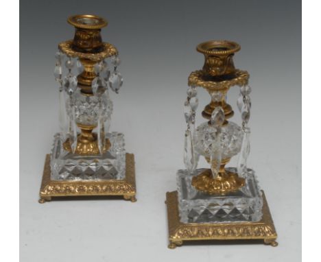 A pair of 19th century Rococo Revival gilt-patinated bronze lustres, beaded lift-out nozzles, bud-shaped sconces cast with sh