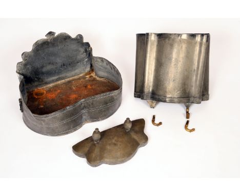 A 17th century French pewter lavabo water fountain and basin, naively engraved with an armorial, the trough 50cm wide
