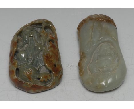 A Chinese mutton fat jade boulder, carved with a bearded immortal, 9cm long; another (2)