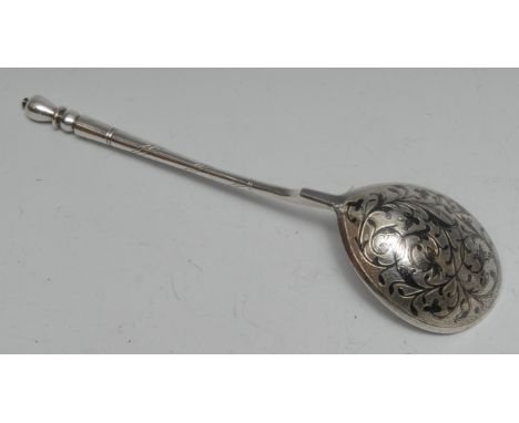 A 19th century Russian silver and niello spoon the bowl decorated to verso with scrolling foliage, 19.5cm long, Moscow 1859